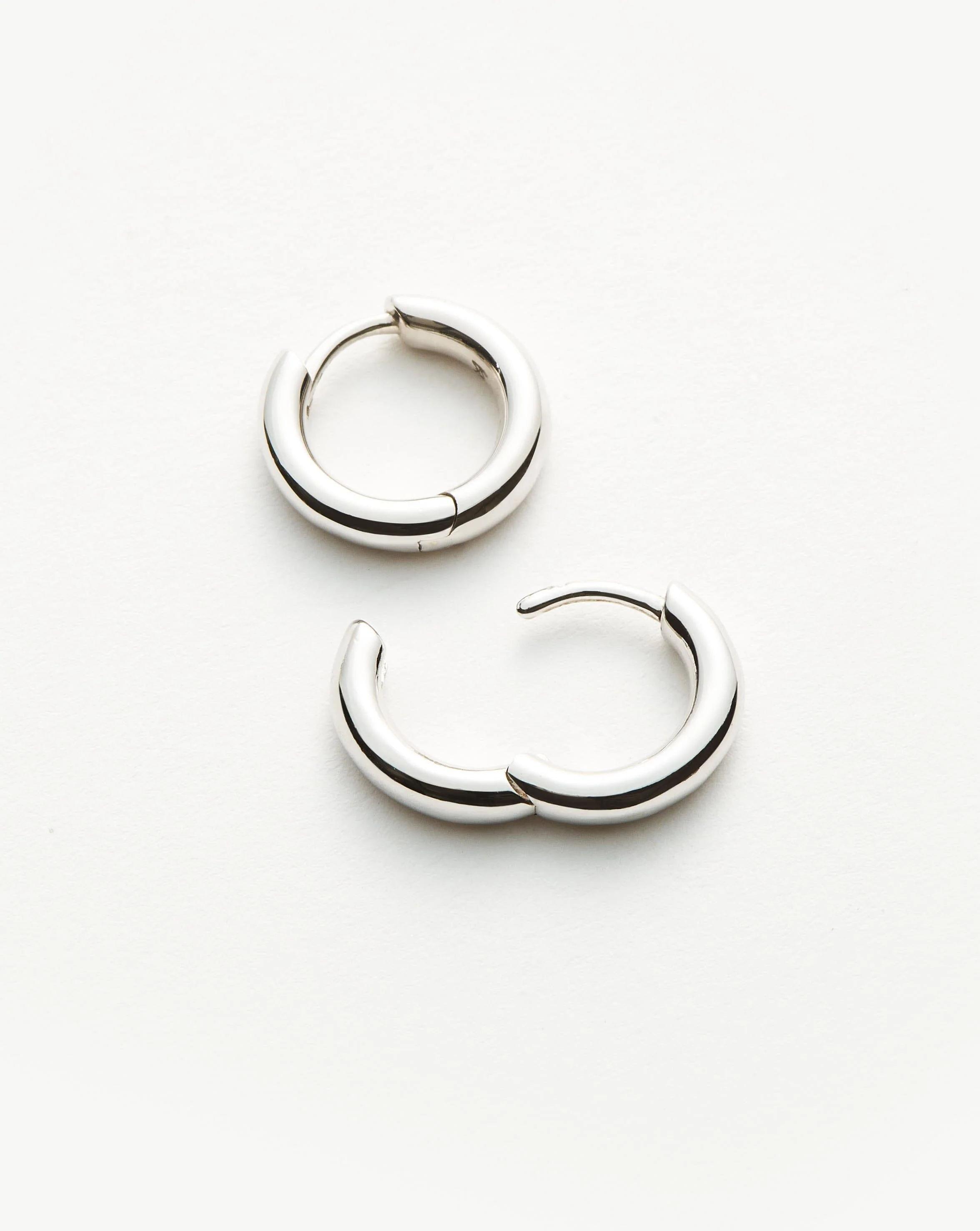 Classic Tunnel Mini Hoop Earrings | Sterling Silver - Image 4