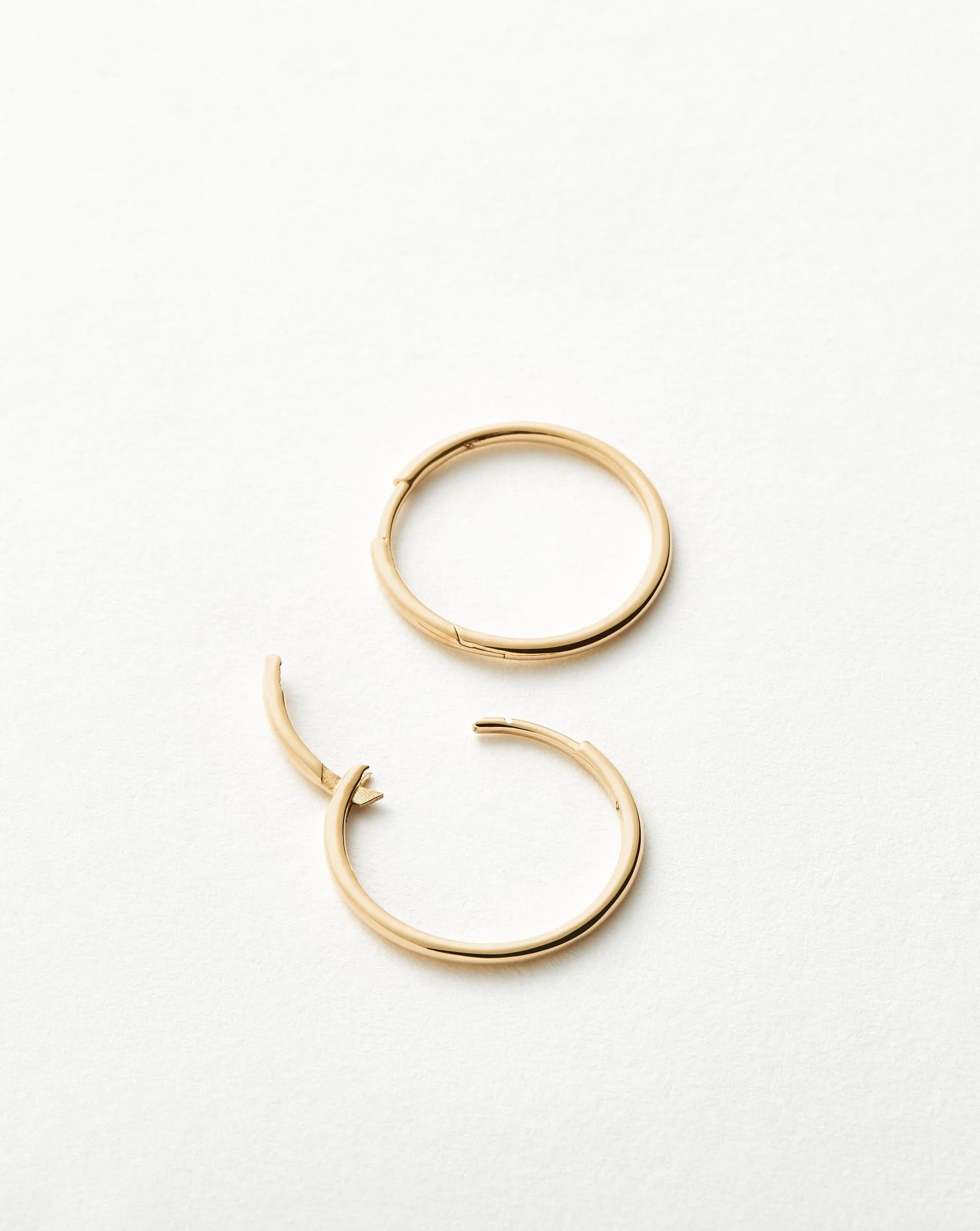 Solid Gold Classic Small Hoop Earrings - Image 4