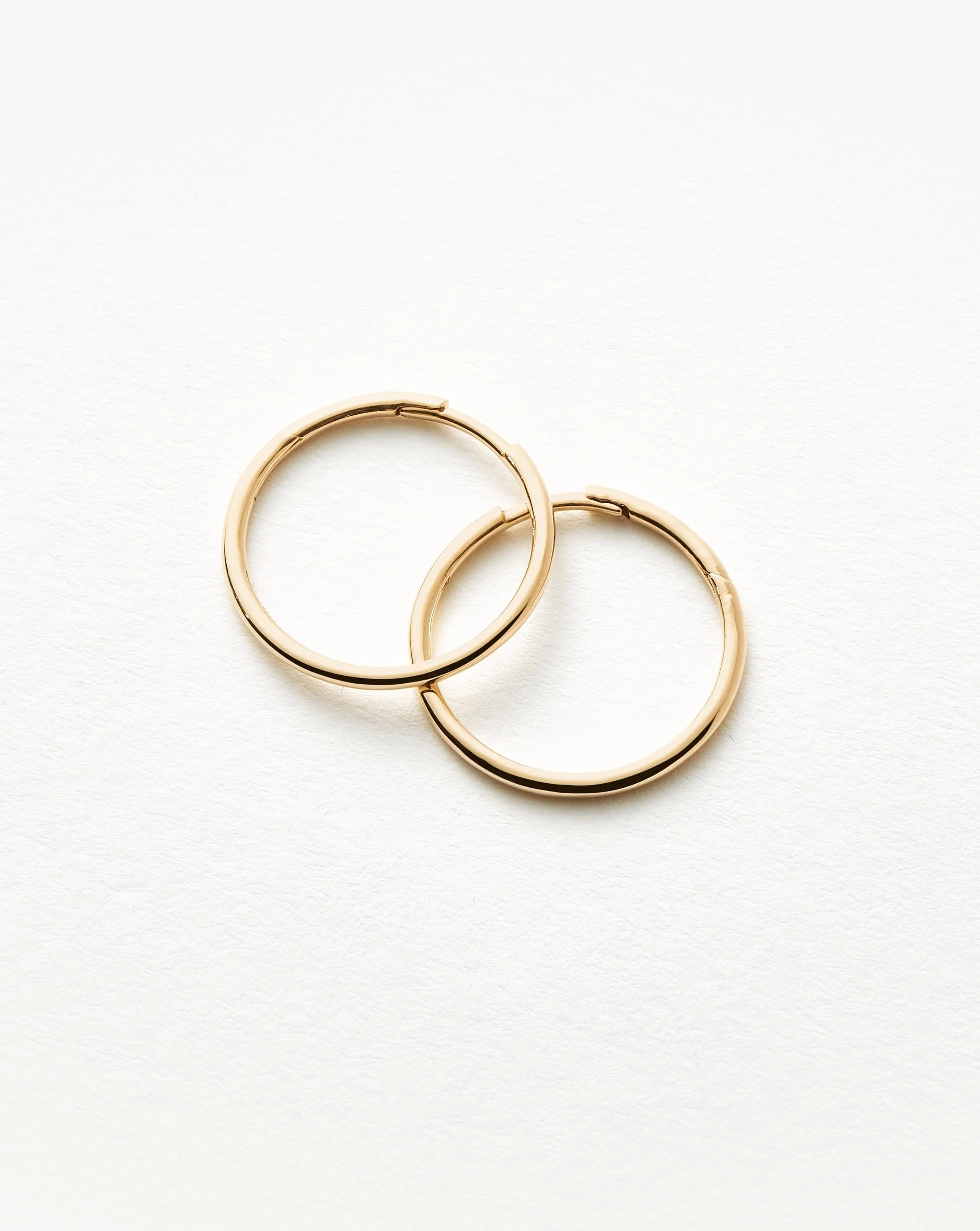 Solid Gold Classic Small Hoop Earrings - Image 5