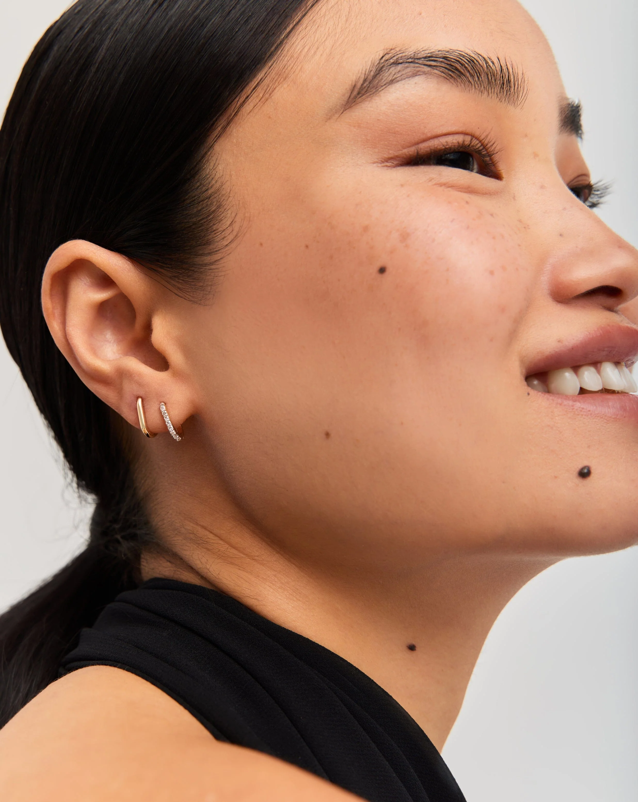 Solid Gold Ovate Mini Hoop Earrings | 14ct Solid Gold - Image 3