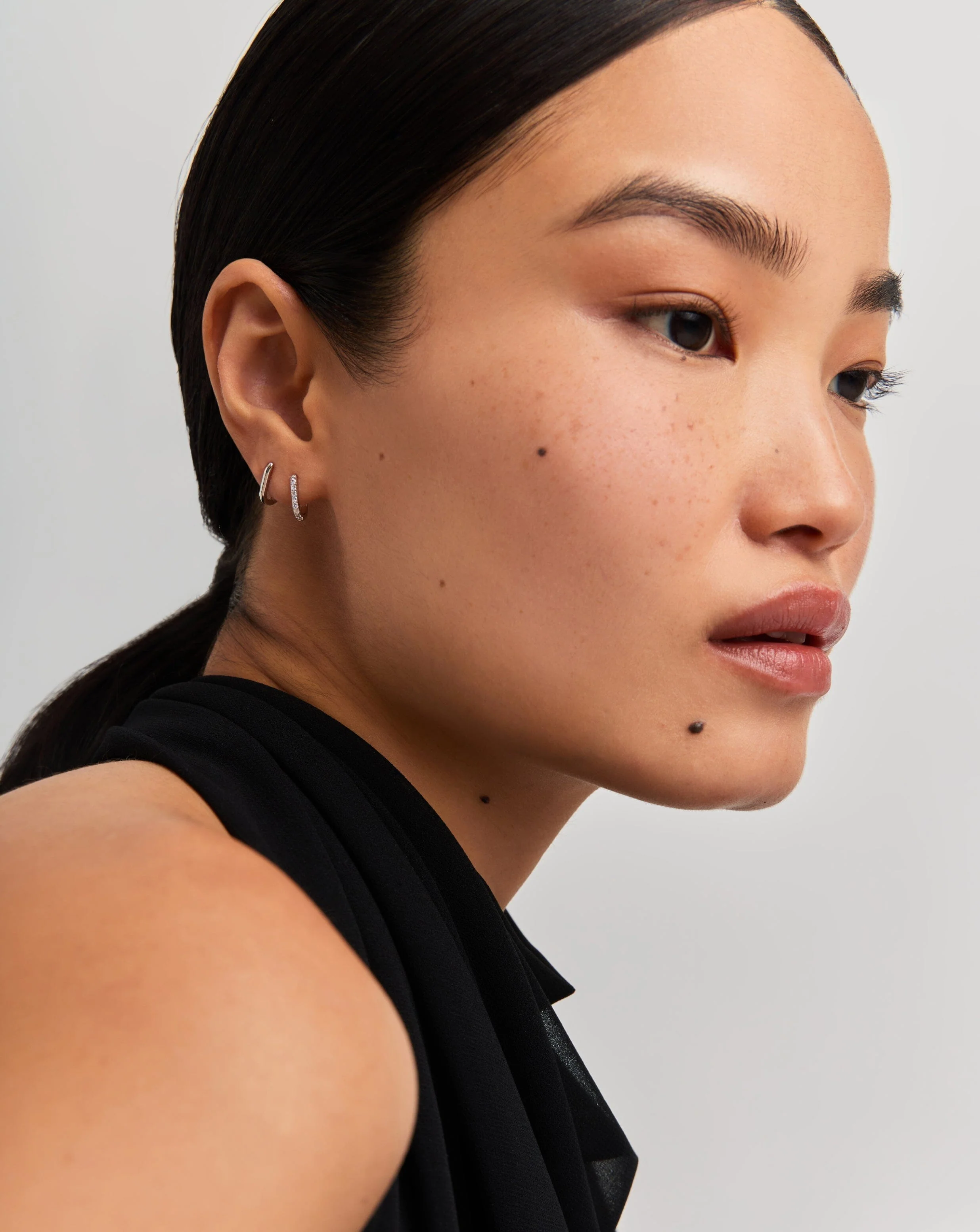 Solid Gold Ovate Mini Hoop Earrings | 14ct Solid White Gold - Image 3
