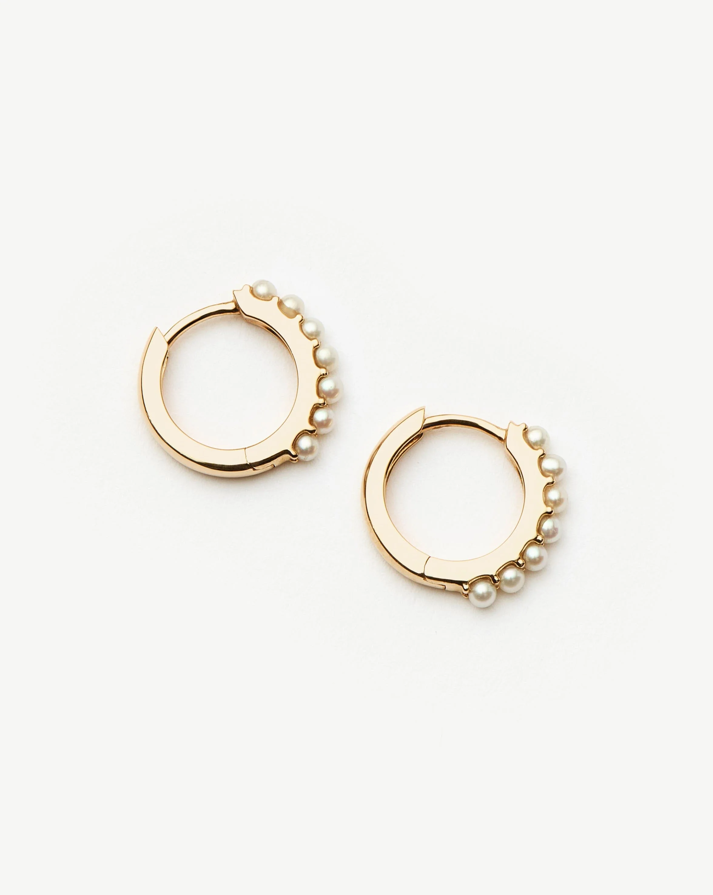 Solid Gold Pearl Huggies - Image 4